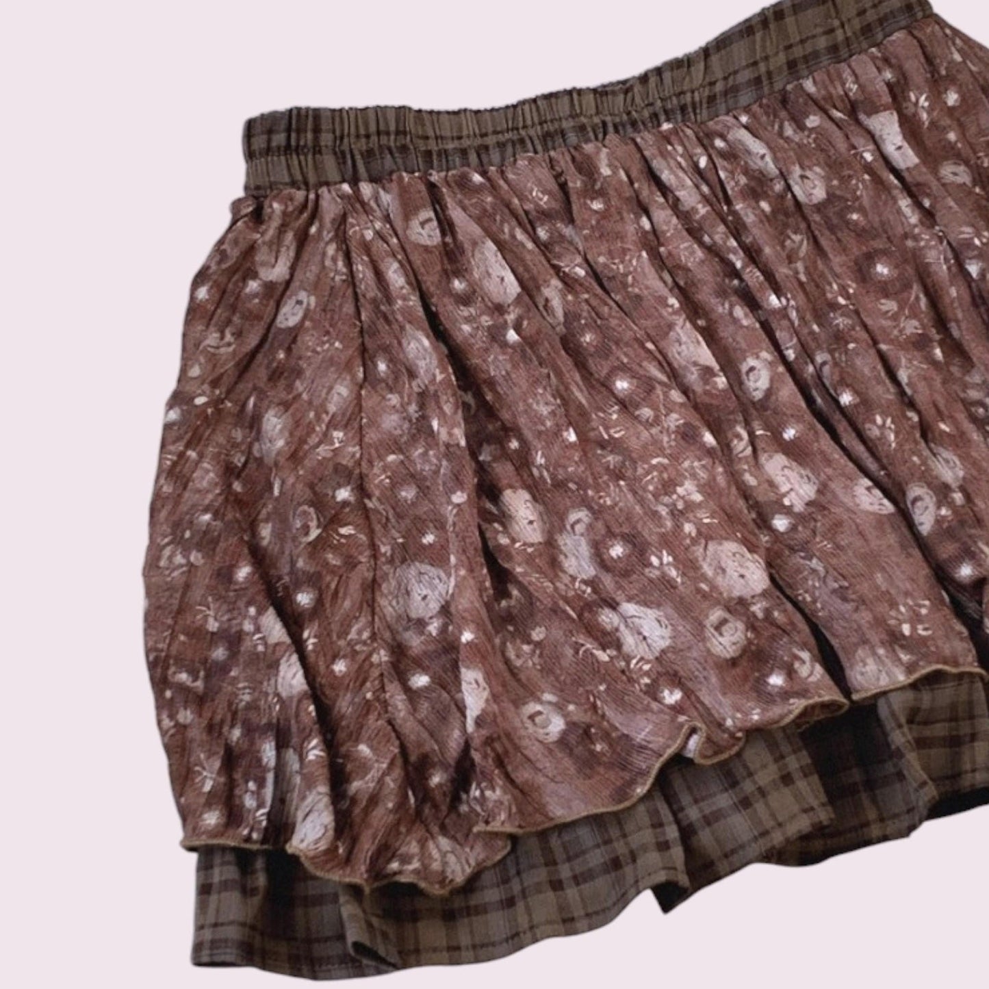 Layered brown pleated skirt with a plaid underlayer5
