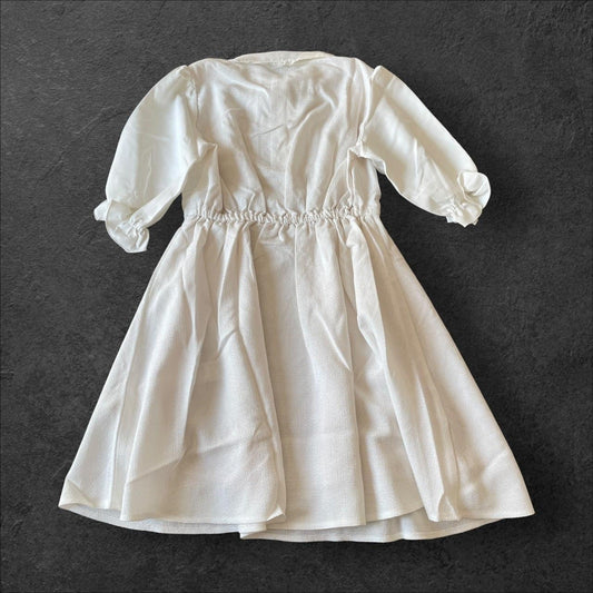 Noemie Jirai Kei ivory dress with a frilled high collar1