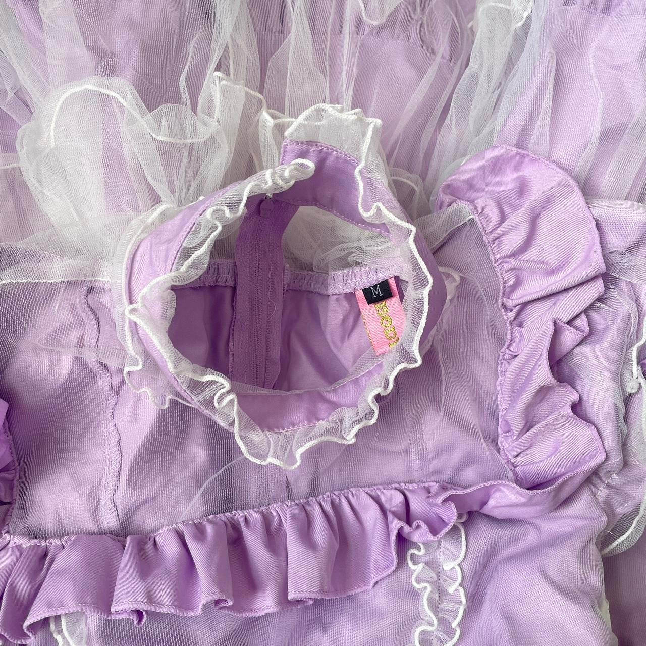 Bodyline lilac dress with ruffled hem dress with a bow and cross-tie detail 6