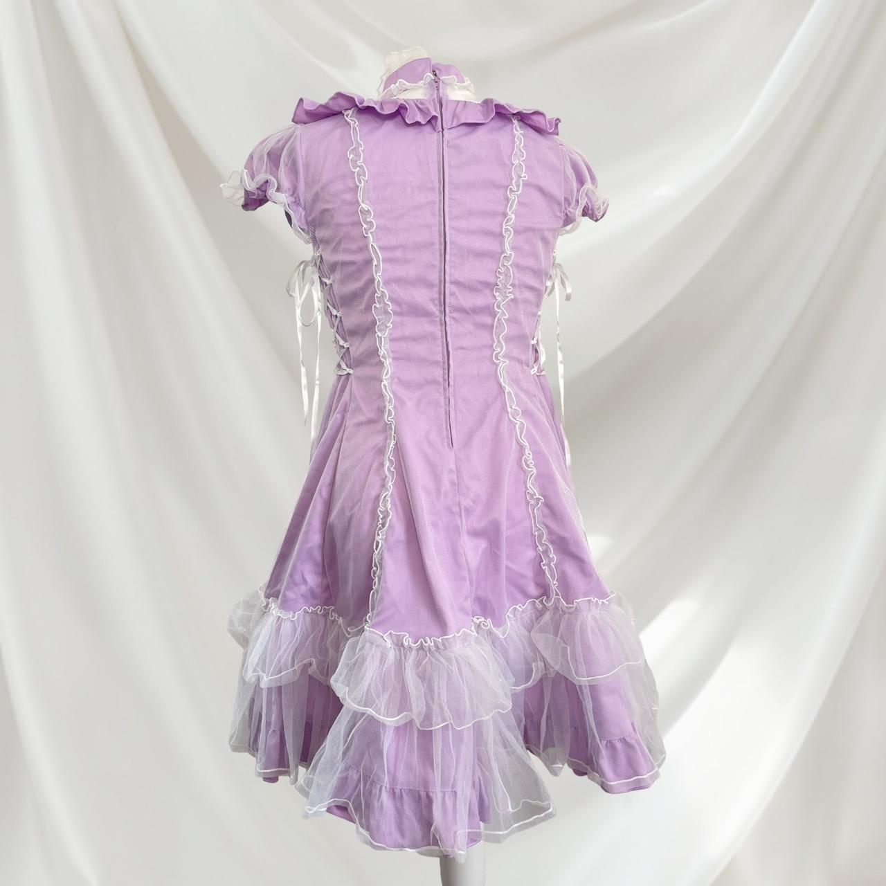 Bodyline lilac dress with ruffled hem dress with a bow and cross-tie detail 3