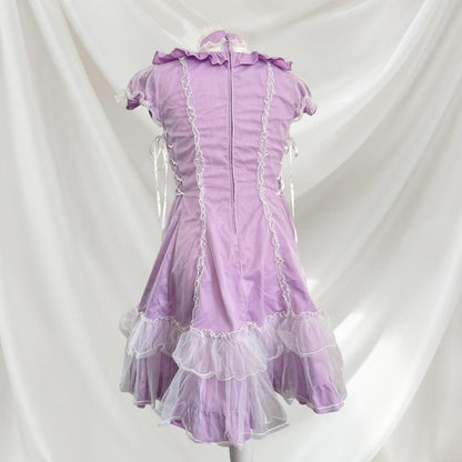 Bodyline lilac dress with ruffled hem dress with a bow and cross-tie detail 3