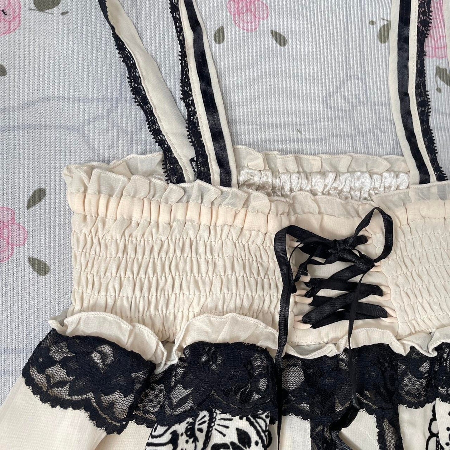 Axes Femme beige dress with rose pattern, laceup front and black lace detailing3
