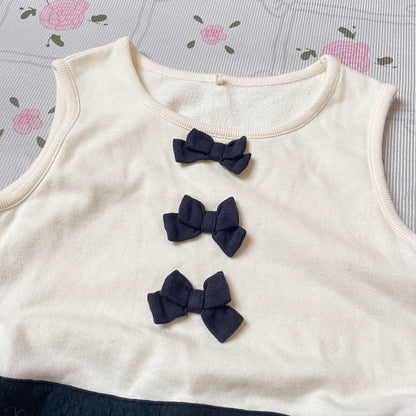 Cream and dark blue sleeveless mini dress/ top from Japanese brand kumikyoku 2
