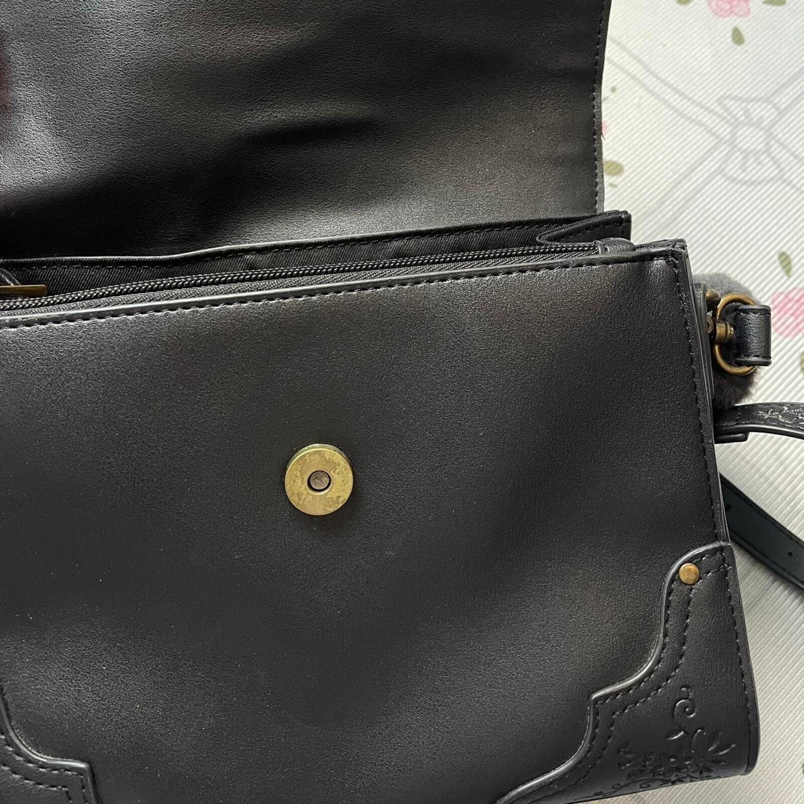 Axes Femme rare shoulder bag with buckle detail and plush handle 6