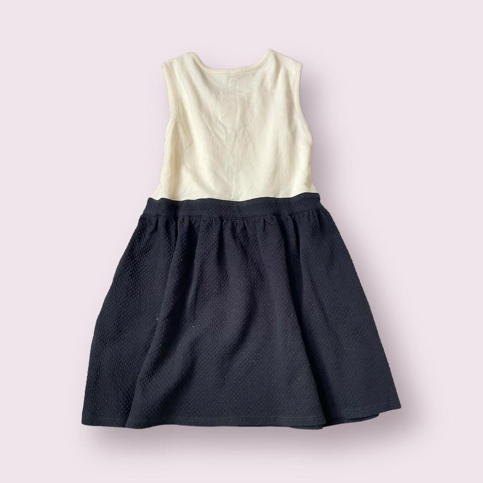 Cream and dark blue sleeveless mini dress/ top from Japanese brand kumikyoku 1