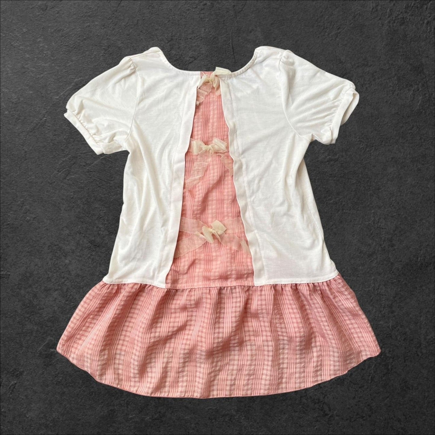 Axes Femme white and pink frill-back top with bow accents1