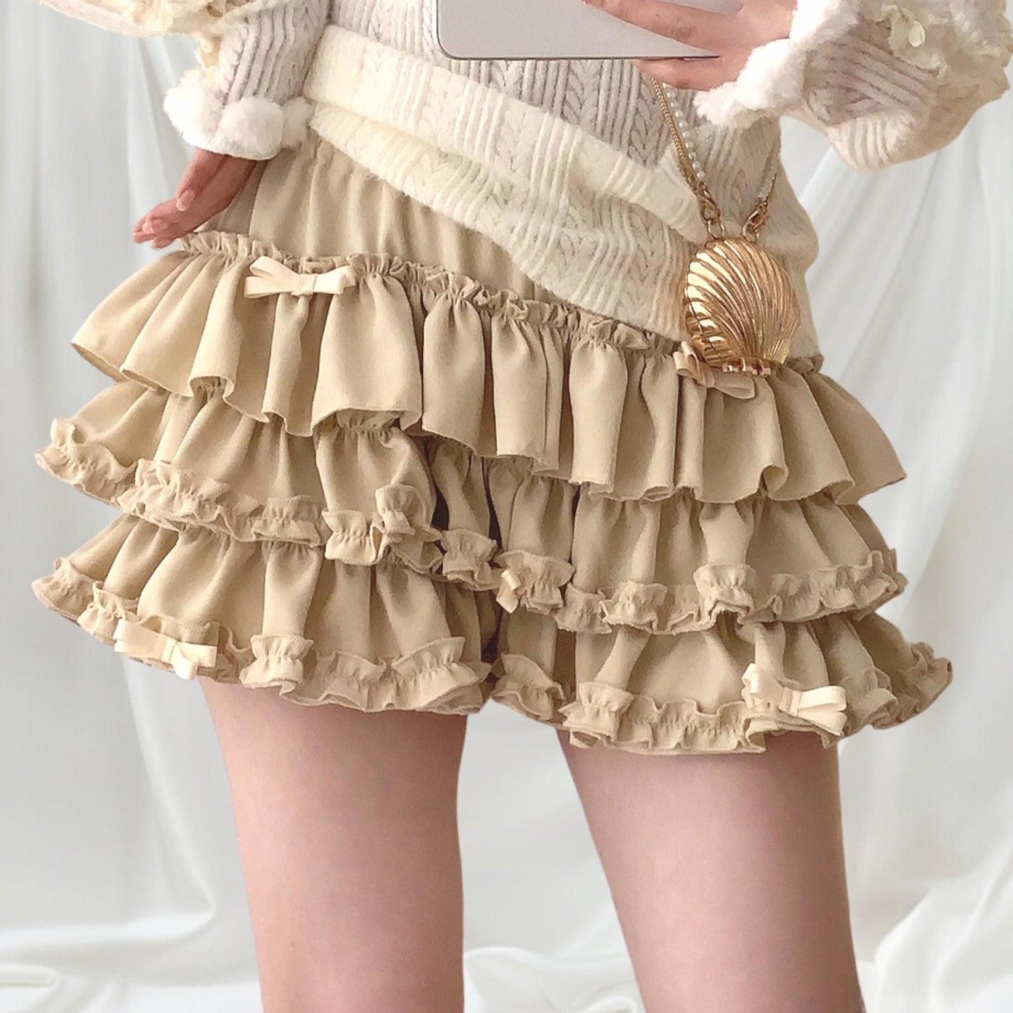 Beige ruffle tiered mini skirt/skort with bow details0