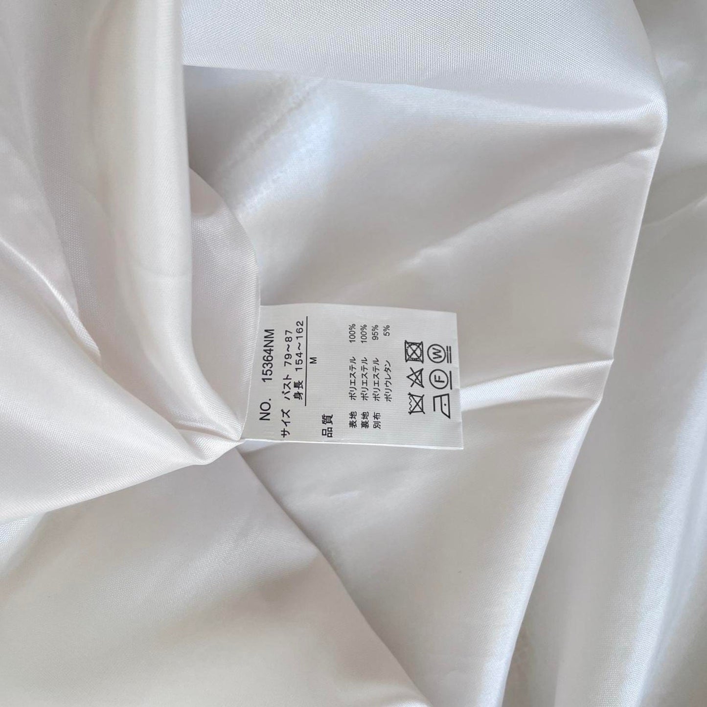 Noemie Jirai Kei ivory dress with a frilled high collar6