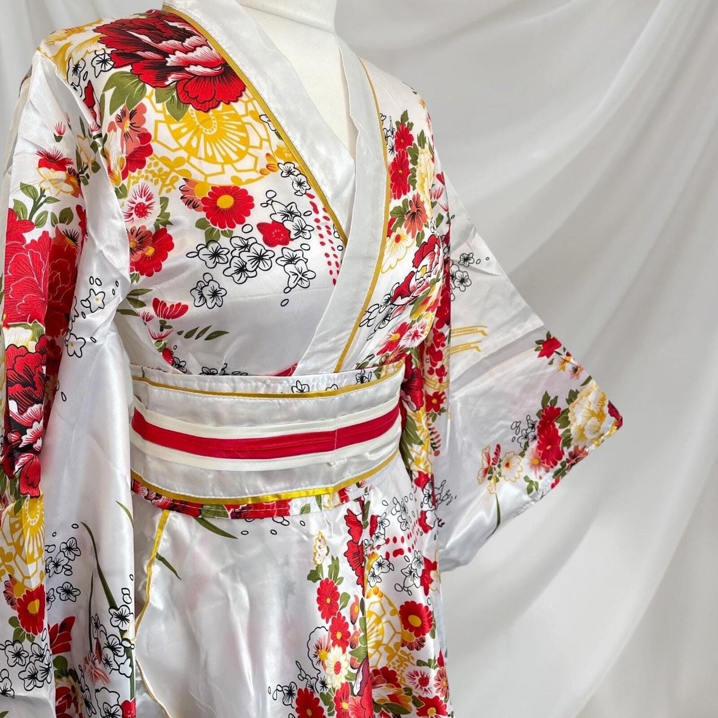 Japanese floral kimono Halloween costume with white socks and holding fan  Cos 1