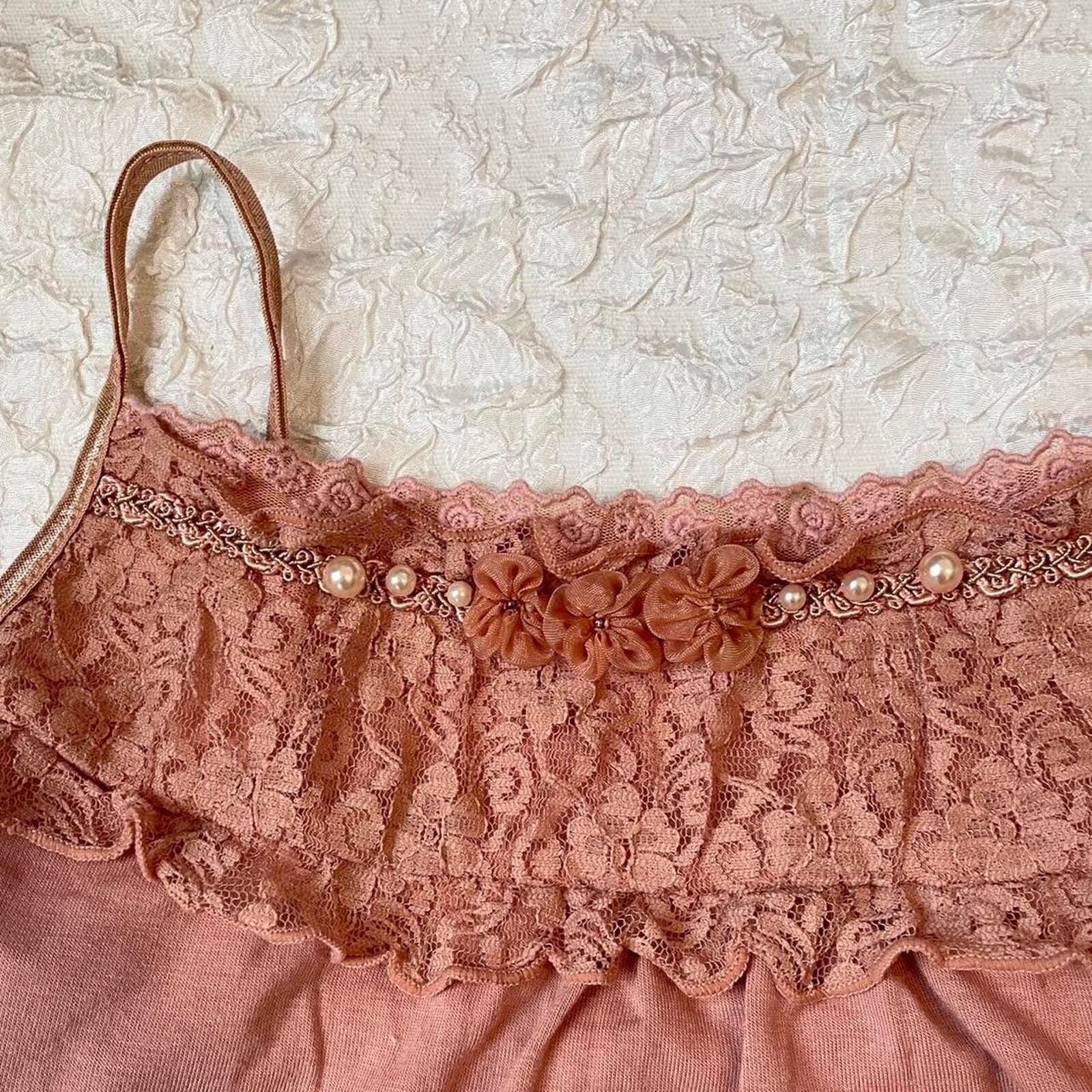 Axes Femme mauve pink adorned with lace, pearls, and floral embroidery 2