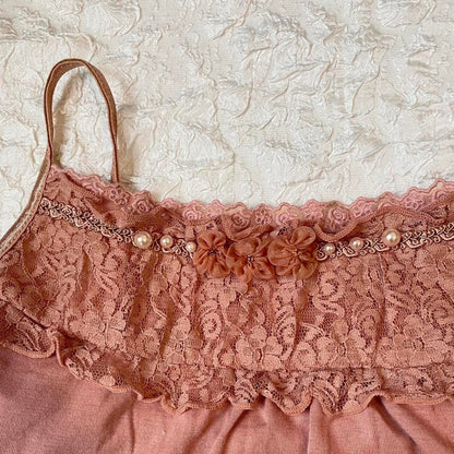 Axes Femme mauve pink adorned with lace, pearls, and floral embroidery 2