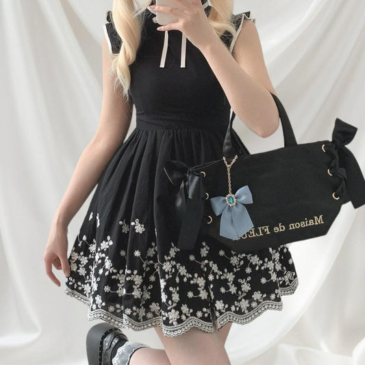 Mini dress in black with floral embroidery detail0