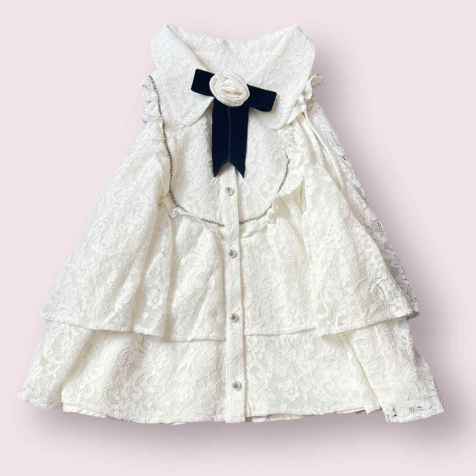 Princess sleeveless top/vest with a flower0