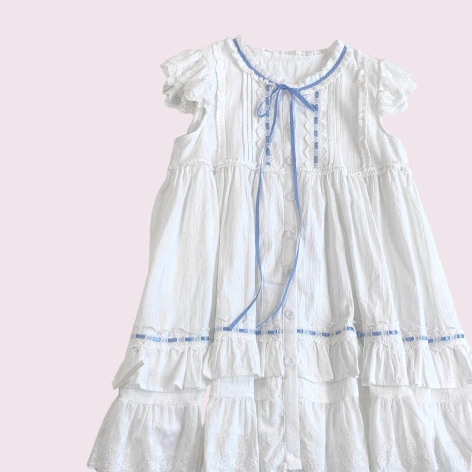 White cotton dress with blue ribbon and lace detail3