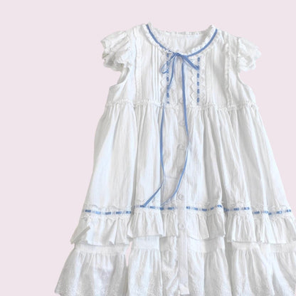 White cotton dress with blue ribbon and lace detail3