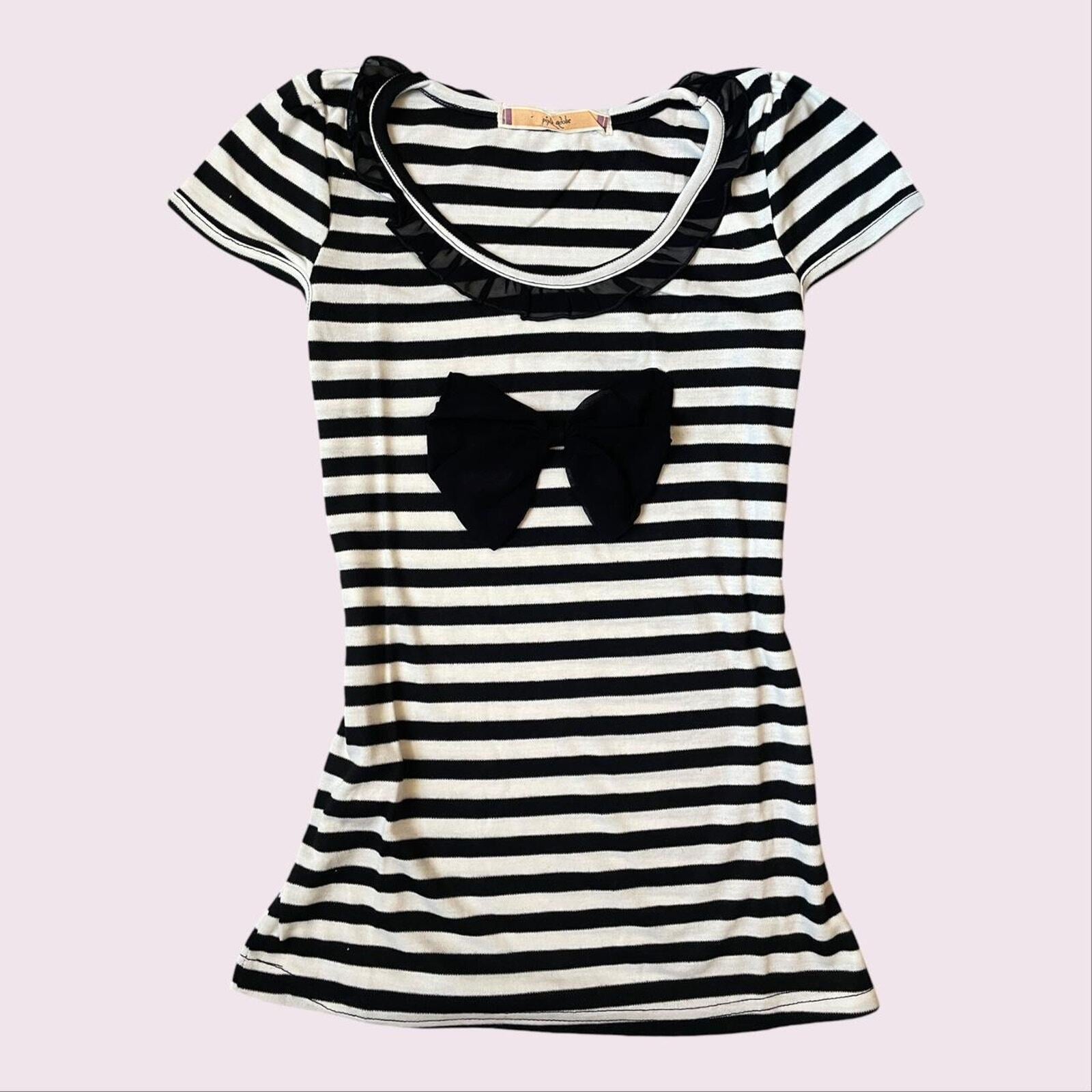 Black and white striped top with black bow and ruffled neckline 0