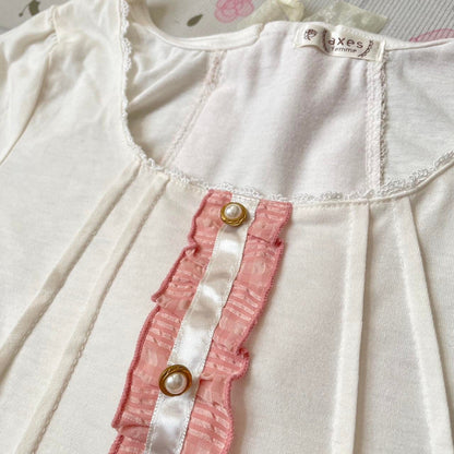 Axes Femme white and pink frill-back top with bow accents2