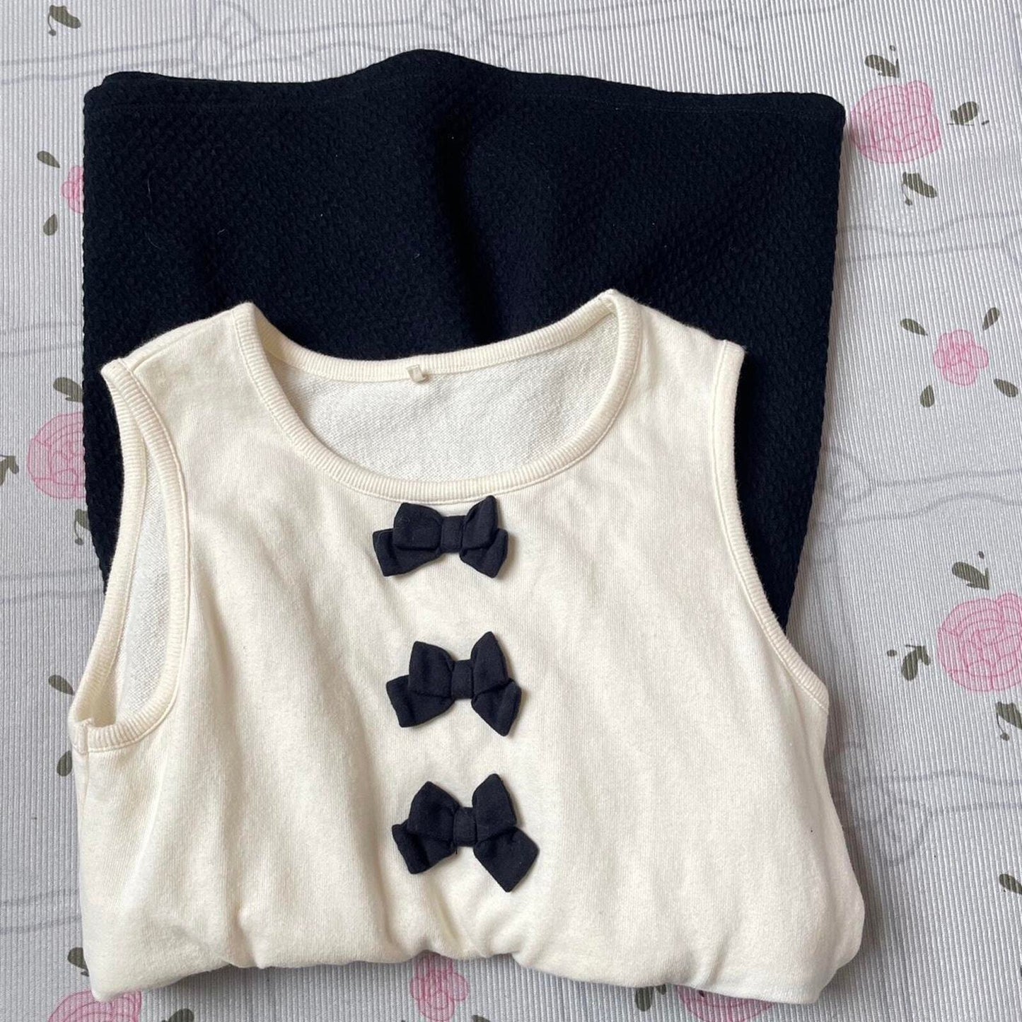 Cream and dark blue sleeveless mini dress/ top from Japanese brand kumikyoku 3
