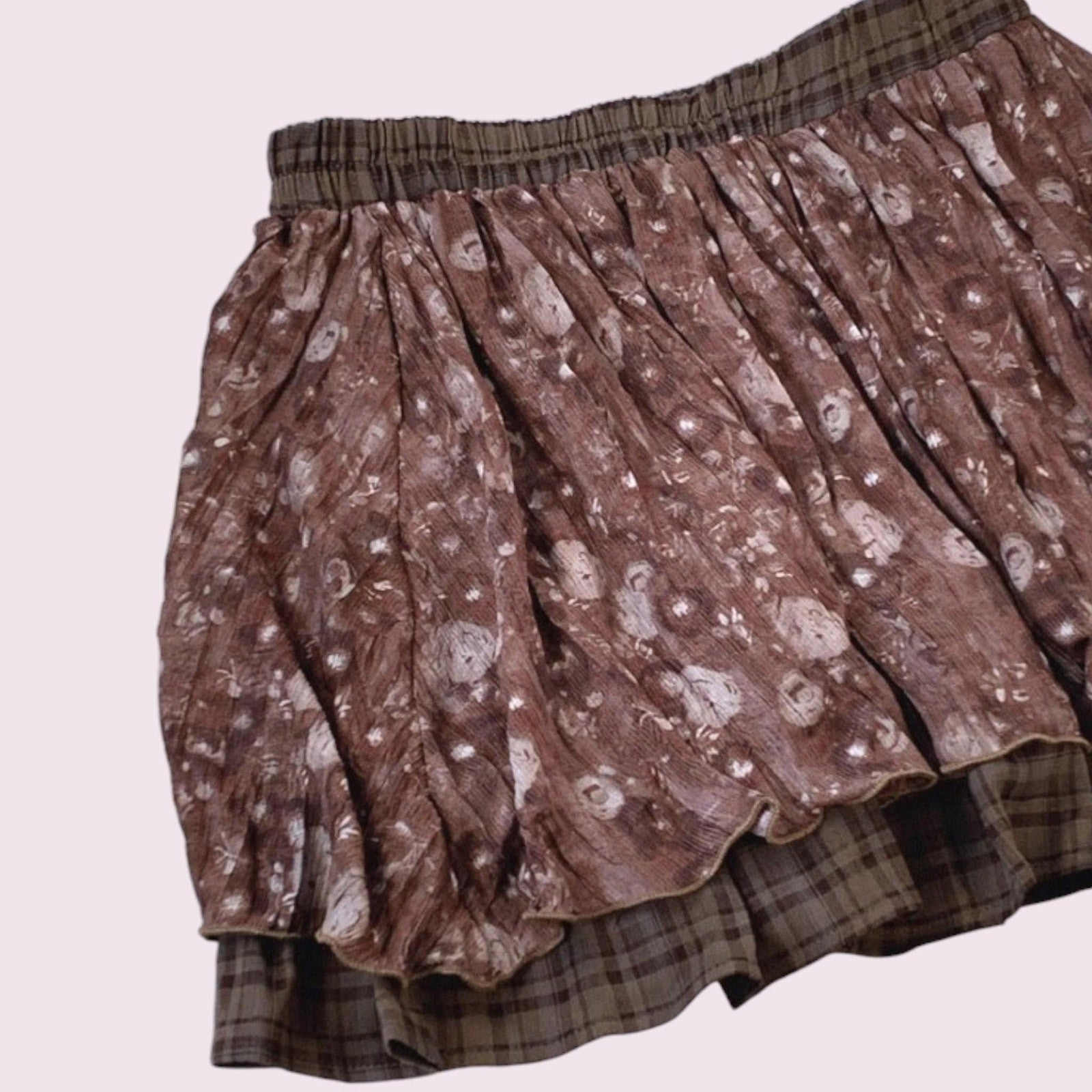 Layered brown pleated skirt with a plaid underlayer5