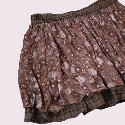 Layered brown pleated skirt with a plaid underlayer5