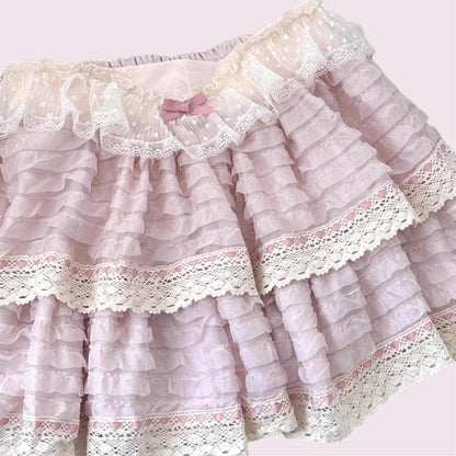 Layered lace ruffle mini skirt with intricate lace trim in soft pink3