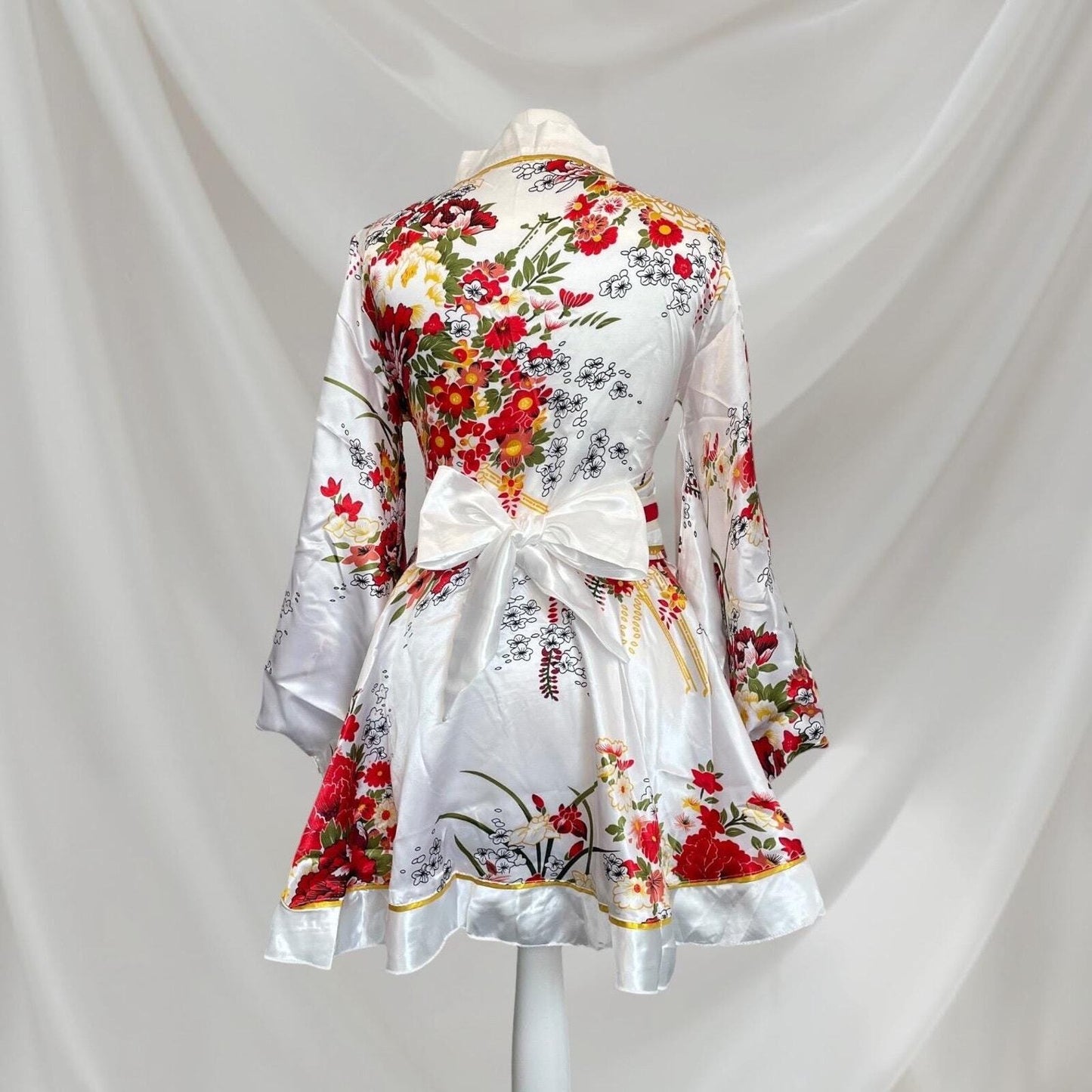 Japanese floral kimono Halloween costume with white socks and holding fan  Cos 4