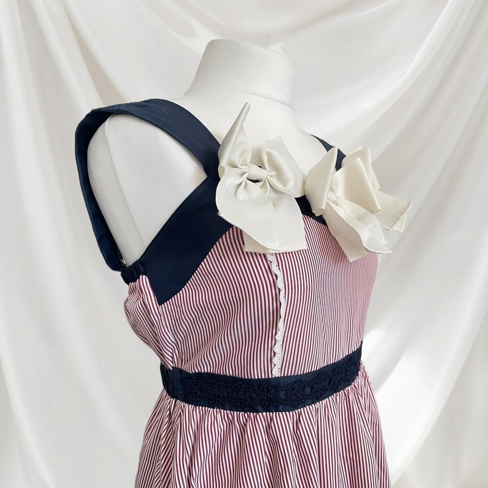 Axes Femme striped dress with statement bows 2