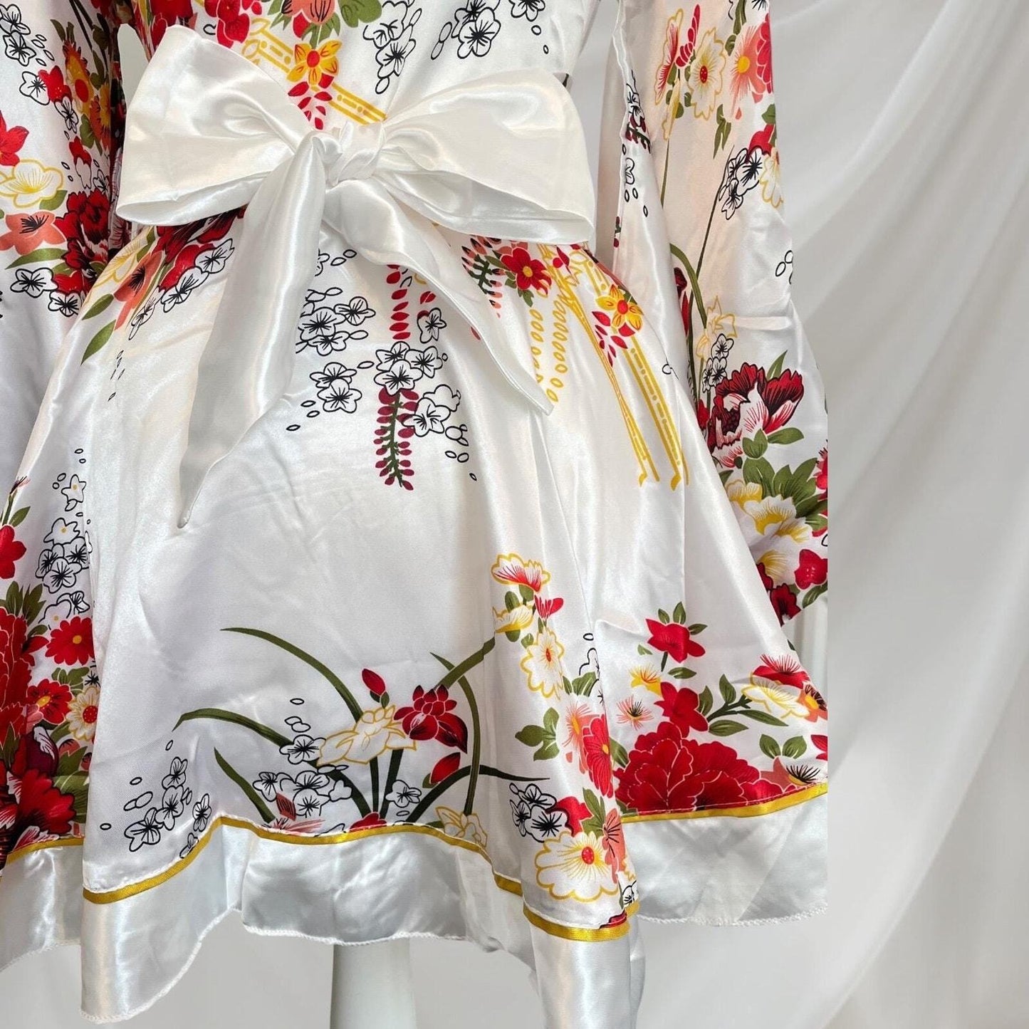 Japanese floral kimono Halloween costume with white socks and holding fan  Cos 5