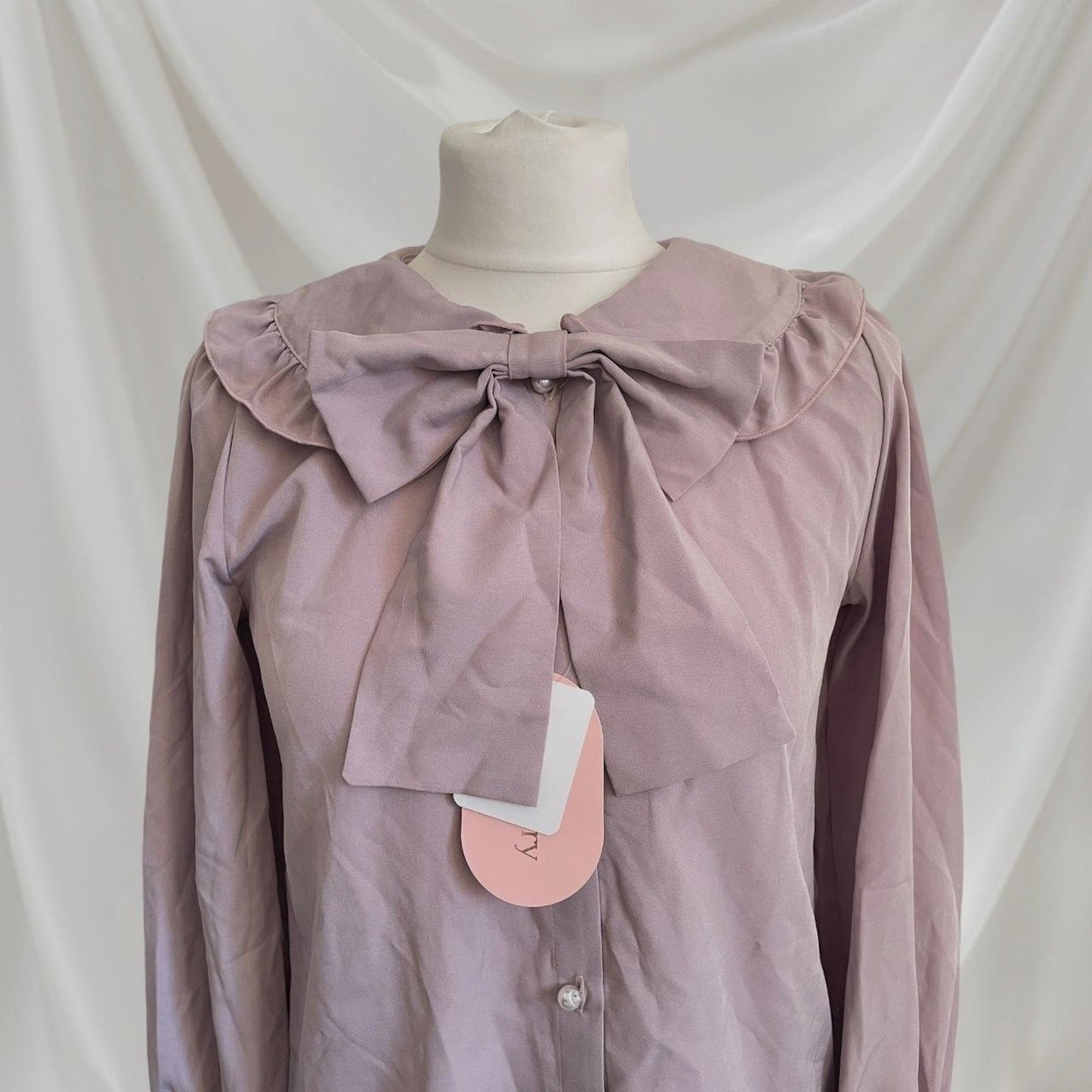 Lily Merry mauve blouse with oversized bow and ruffled collar1