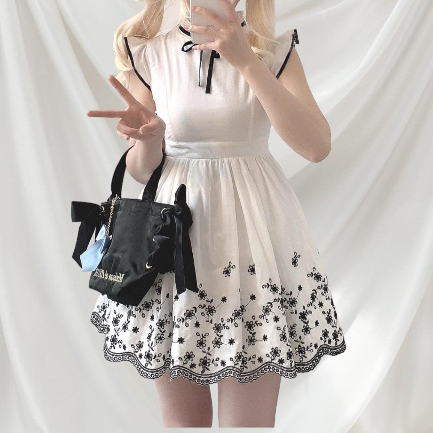 Evelyn mini cotton dress in white with floral embroidery detail Kawaii Japan3