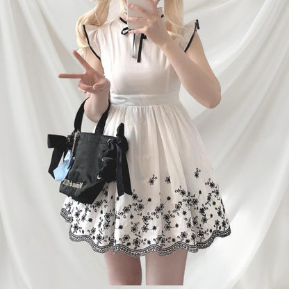 Evelyn mini cotton dress in white with floral embroidery detail Kawaii Japan3