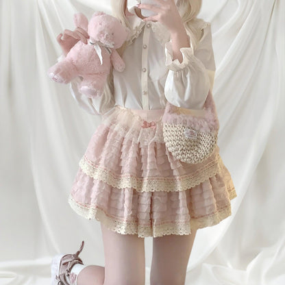 Layered lace ruffle mini skirt with intricate lace trim in soft pink1