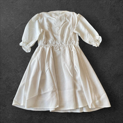 Noemie Jirai Kei ivory dress with a frilled high collar2