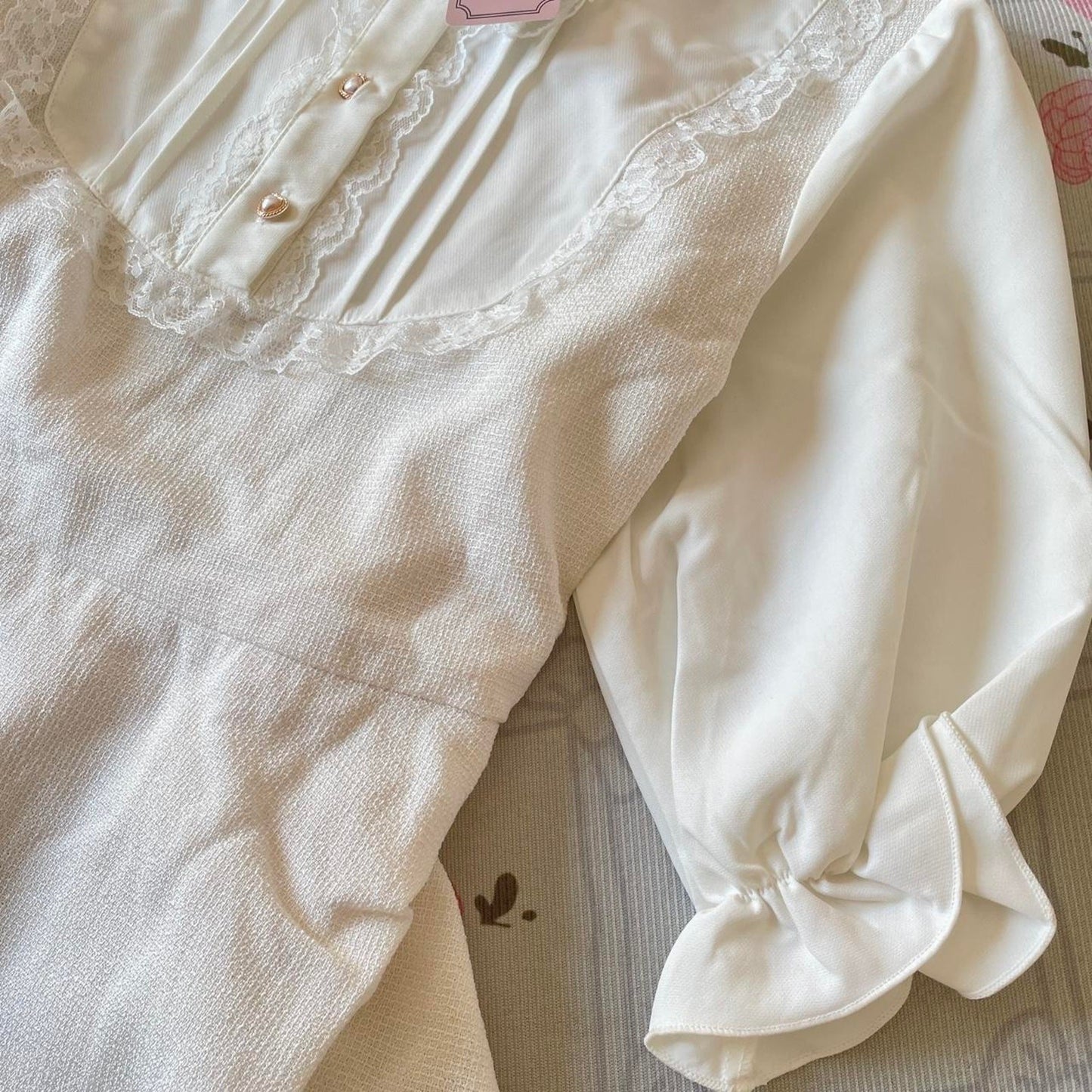 Noemie Jirai Kei ivory dress with a frilled high collar4