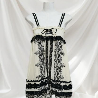 Axes Femme beige dress with rose pattern, laceup front and black lace detailing0