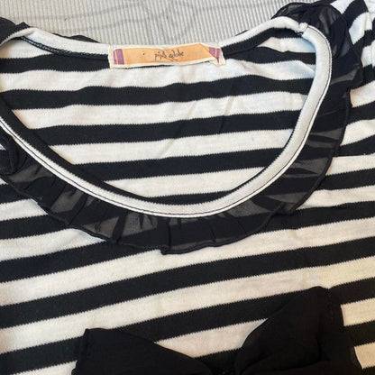 Black and white striped top with black bow and ruffled neckline 1