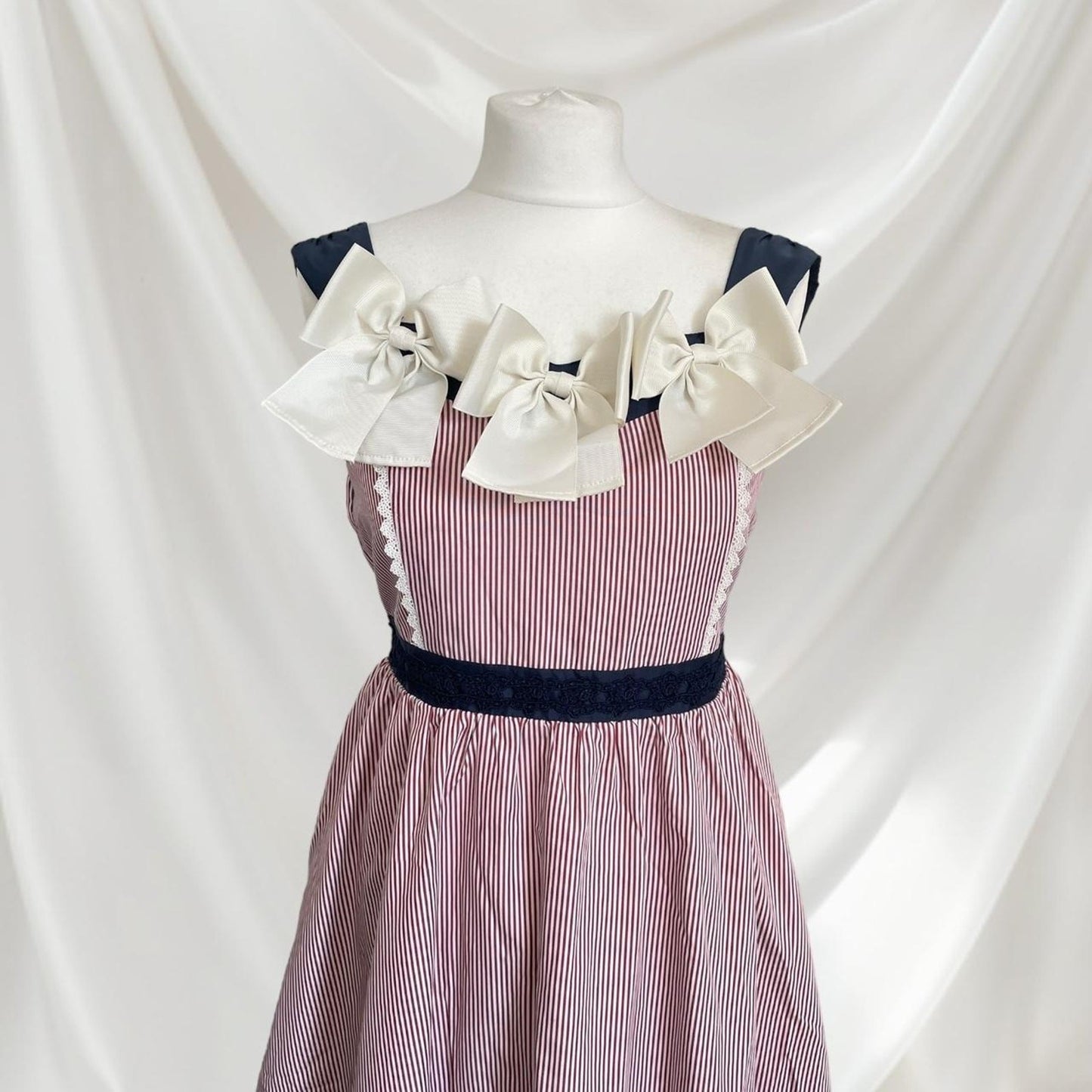Axes Femme striped dress with statement bows 1