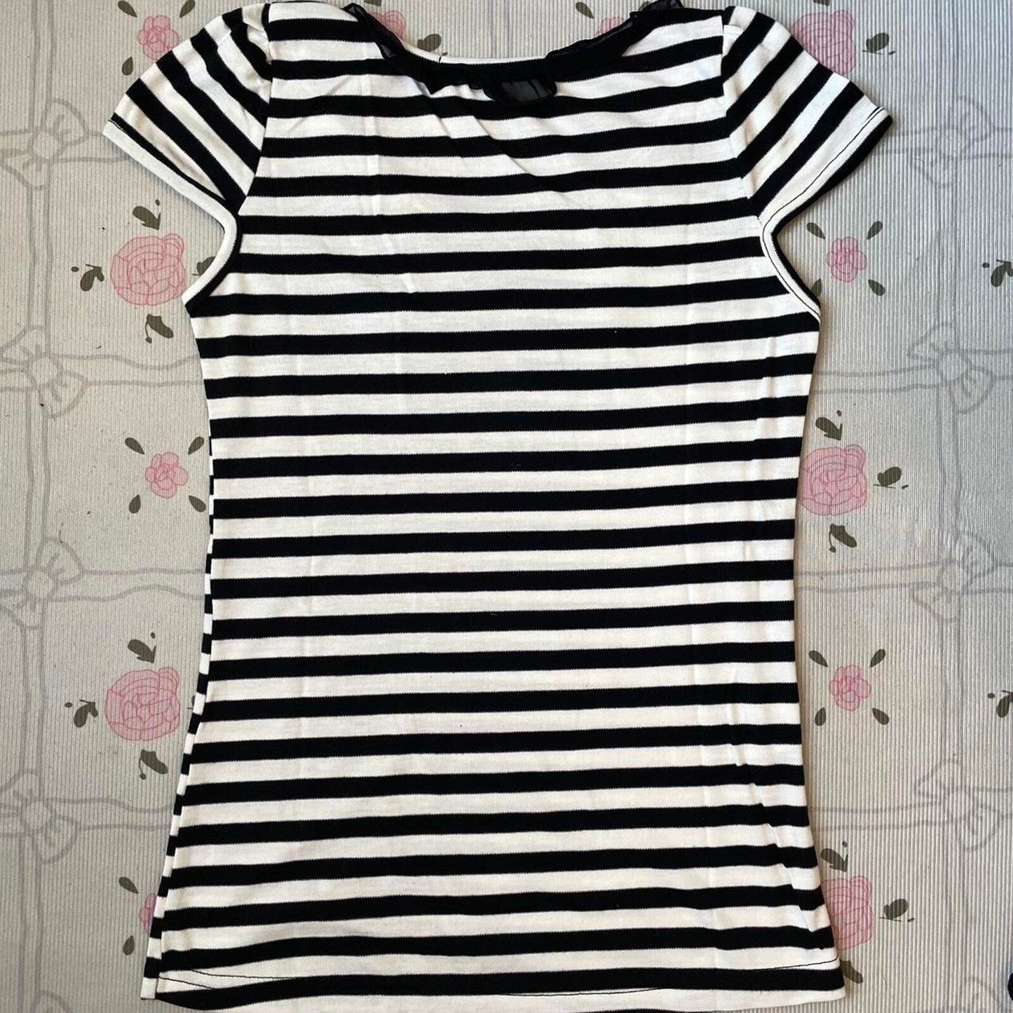 Black and white striped top with black bow and ruffled neckline 3