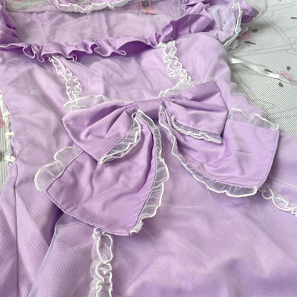 Bodyline lilac dress with ruffled hem dress with a bow and cross-tie detail 5