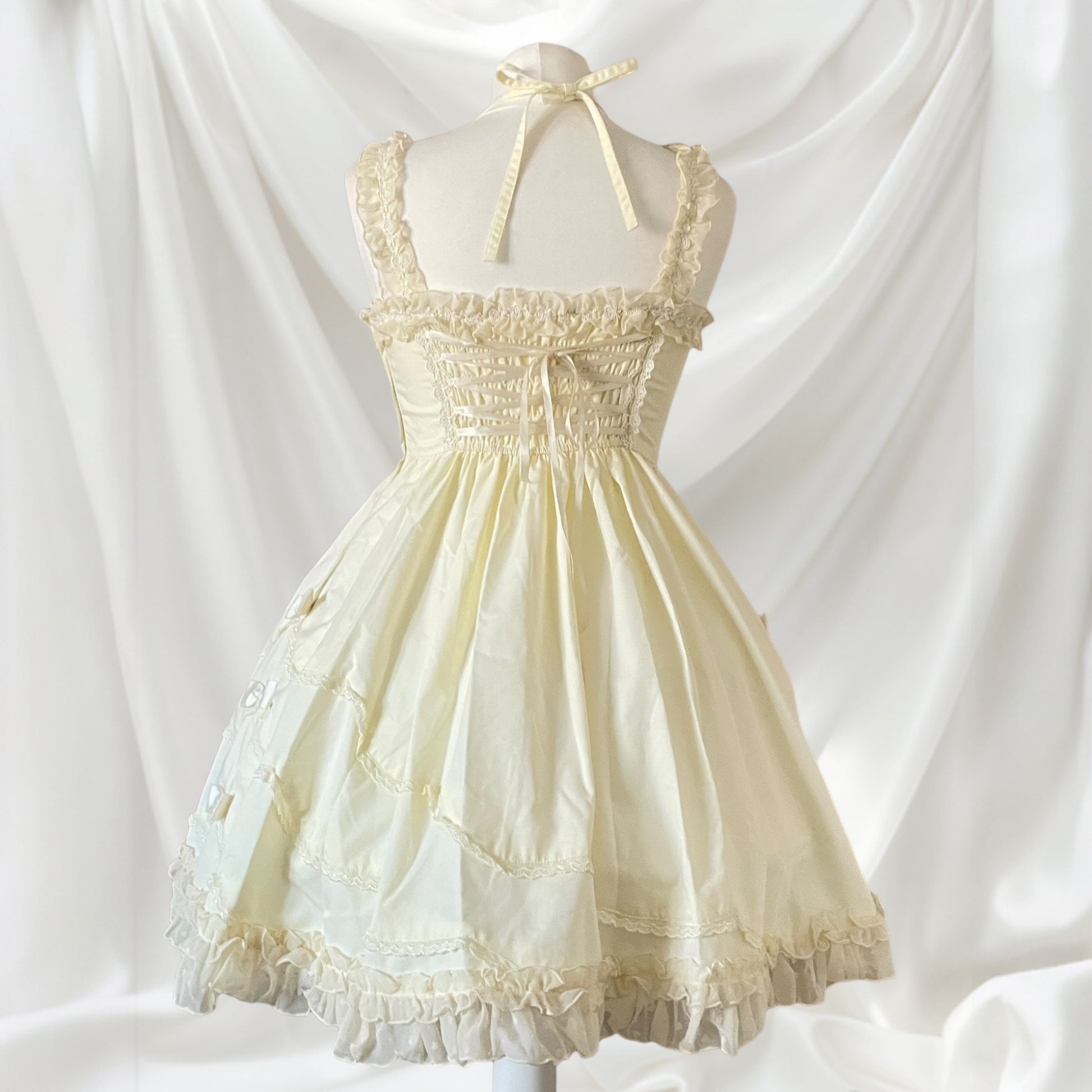 Bodyline sweet lolita cream dress with oversized bow embellishments 2