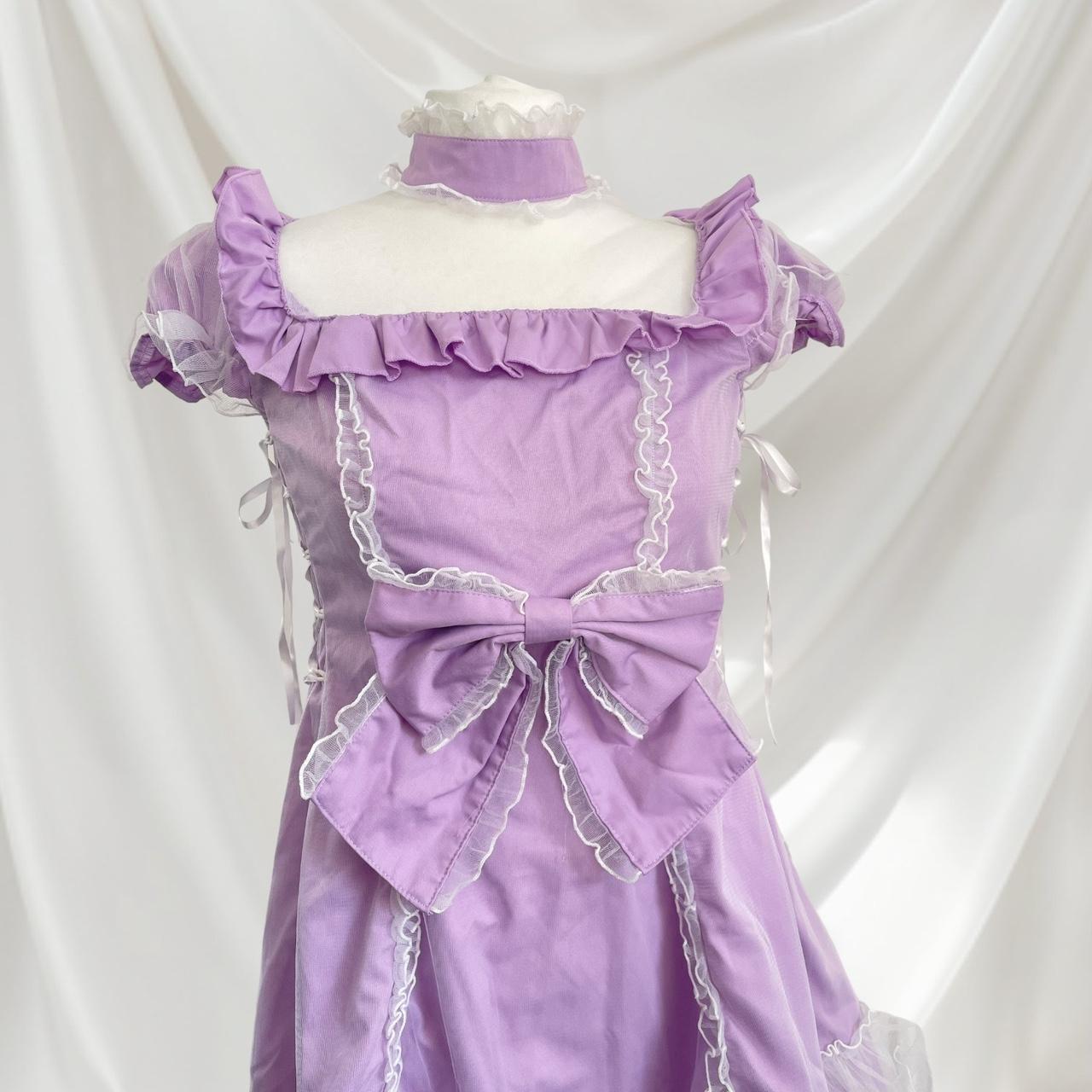 Bodyline lilac dress with ruffled hem dress with a bow and cross-tie detail 4