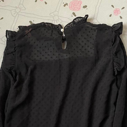 Ank Rouge black sheer blouse with ribbon and ruffle details1